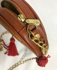 Vintage MCM brown monogram mini Suzy Wong chain shoulder purse with red fringes. Designed by Michael Cromer. Rare purse.