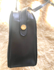 Vintage Salvatore Ferragamo dark navy leather shoulder bag with golden logo embossed motif from vara collection. Classic purse.