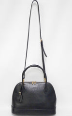 Vintage Valentino Garavani black leather bolide bag with shoulder strap, V logo, a fringe. Classic dialy use purse.