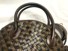 Vintage Bottega Veneta brown, khaki, and black leather intrecciato bolide style handbag with tassel charms. Rare color purse.