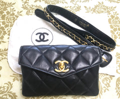 1980s. Vintage CHANEL black lamb leather belt bag, waist bag, fanny pack with golden chain belt & CC closure.  Belt size good for 23.8" through 26.2" (60.5-66.5cm)