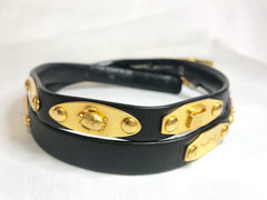 Vintage CHANEL black belt with golden buckle and iconic logo motifs, CC mark, camellia flower, turtle, perfume, clover. Must-have belt.