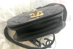 Vintage CHANEL 2.55 black fanny pack, belt bag with round flap and golden CC closure hock. Rare must have piece.