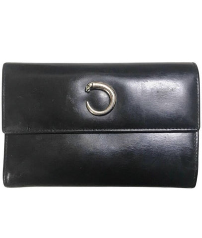 Vintage Cartier black leather wallet with silver tone kiss lock closure. Panthere collection. Unisex use.