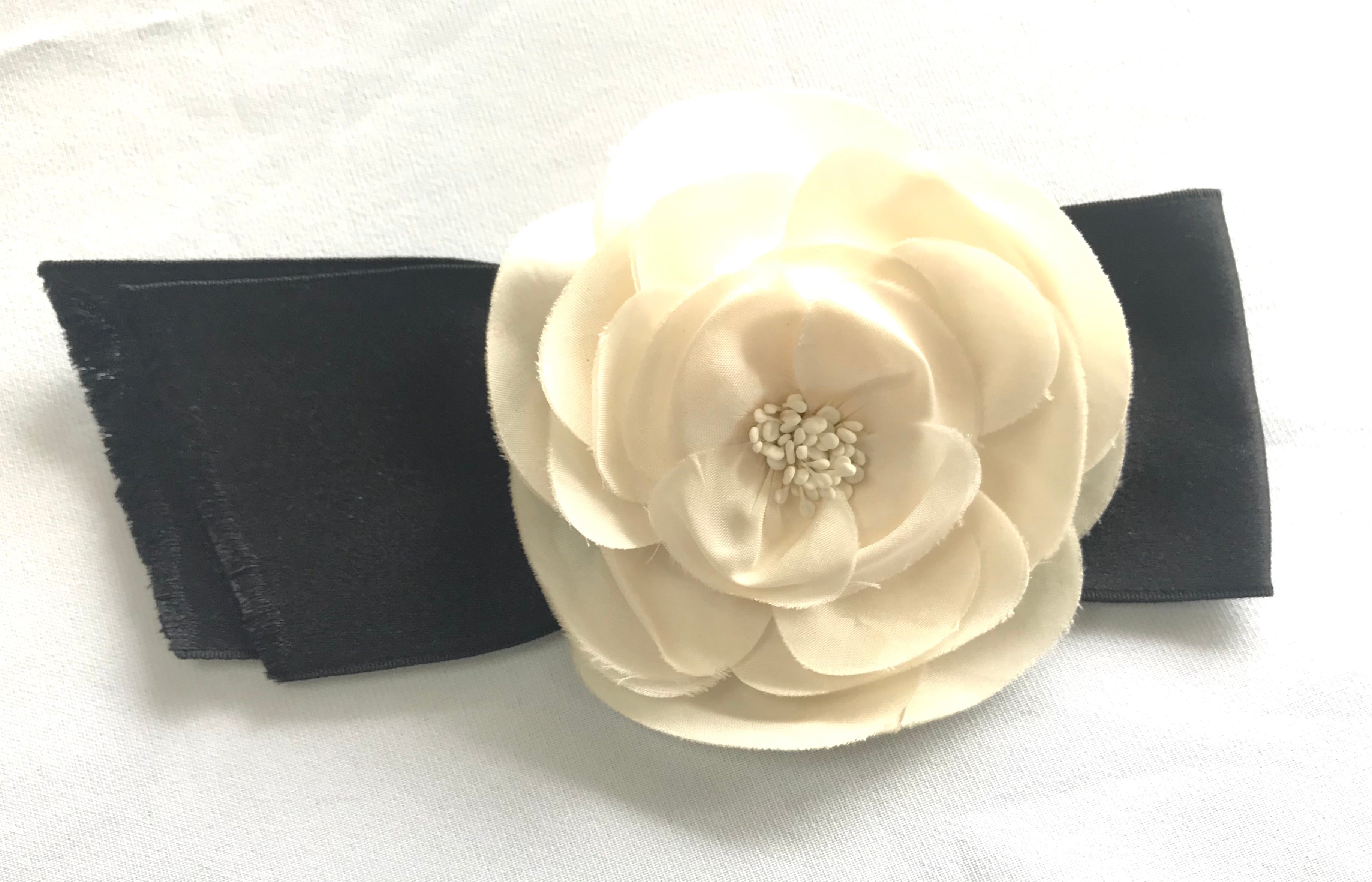 Vintage CHANEL classic ivory camellia and black bow brooch pin