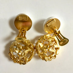 Vintage Salvatore Ferragamo white faux pearl dangle earrings with golden shoe design featured charm. Gorgesous jewelry.