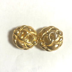 Vintage CHANEL gold tone round earrings with CC mark. Classic vintage Chanel jewelry.