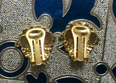 Vintage Gianni Versace gold tone medusa face motif earrings. Must have Lady Gaga style jewelry piece. Great gift.