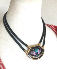 Vintage Hermes black necklace with bird and flag printed enamel pendant top. Ceramic jewelry piece.
