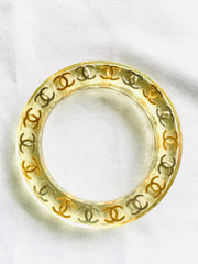 Vintage CHANEL resin bangle, bracelet with gold and silver CC marks. One of a kind jewelry piece. Best piece for summer.