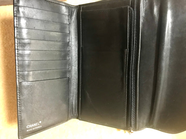 Vintage CHANEL black leather wallet with large CC stitch mark. Rare wa –  eNdApPi ***where you can find your favorite designer  vintages..authentic, affordable, and lovable.