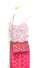Vintage CHANEL red lamb leather shoulder bag with golden CC button motifs at flap. Rare purse.