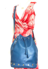 Vintage LANVIN blue grained leather hobo bucket shoulder bag with golden logo motifs.