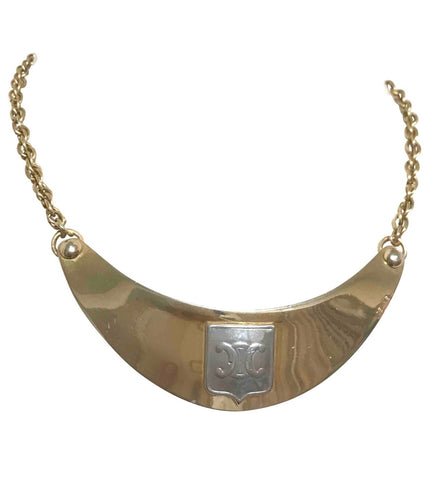 Vintage Celine gold tone crescent moon shape neckkace with silver logo.