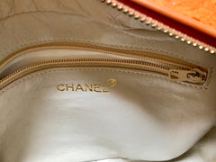 Vintage CHANEL orange tweed matelasse chain shoulder bag, camera bag with CC tassel charm. Must have rare purse.
