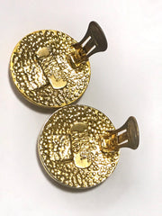 Vintage Gianni Versace round gold tone medusa face motif earrings. Must have Lady Gaga style jewelry piece. Great gift.