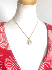 Vintage CELINE golden round logo with rhinestone pendant top skinny chain necklace. Perfect jewelry piece for any occasion.
