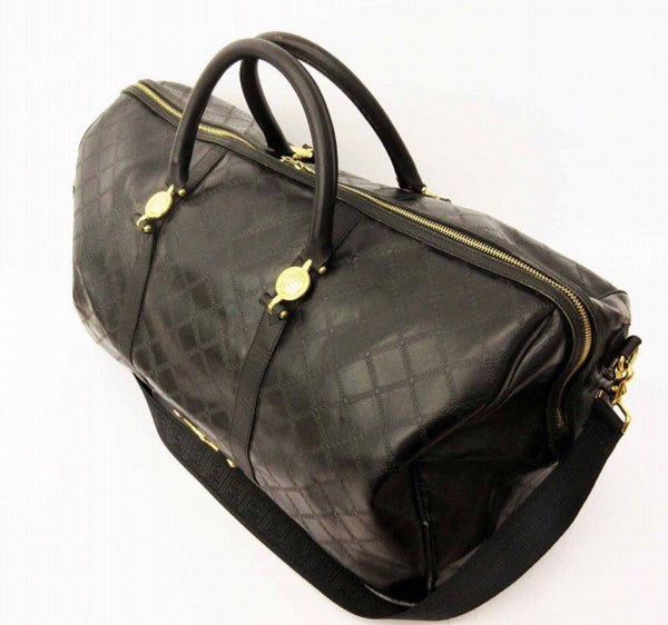 Vintage Gianni Versace genuine black leather travel bag with