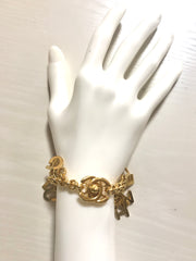 Vintage Chanel Turnlock CC closure and CHANEL letter dangle bracelet. Must have 90s jewelry. CC and logo letter charm bracelet.