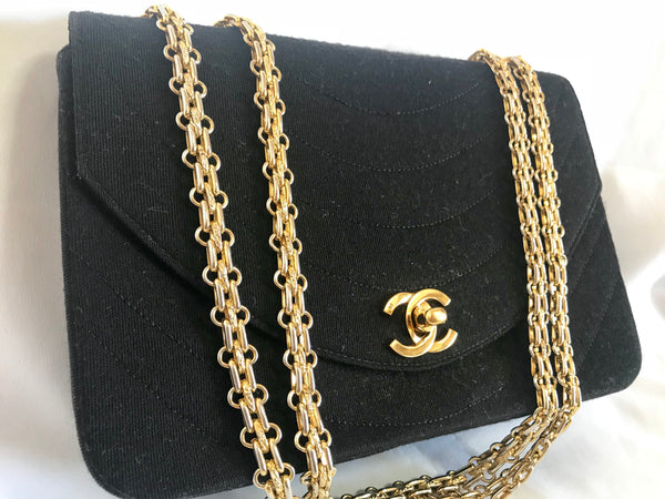 Vintage CHANEL unique oval U stitch black jersey classic 2.55 flap ski – eNdApPi  ***where you can find your favorite designer vintages..authentic,  affordable, and lovable.