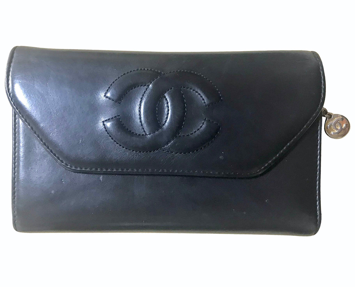 Vintage CHANEL black leather wallet with large CC stitch mark. Rare wallet from Chanel in 90’s.