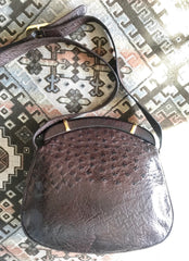Vintage GUCCI dark brown genuine ostrich leather fisherman bag style shoulder bag with logo embossed motif. Rare masterpiece.