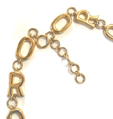 Vintage Moschino chain statement necklace with golden O and R letter charms with logos.
