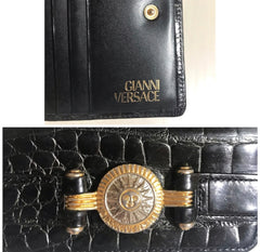 Vintage Gianni Versace black croc embossed leather wallet. Golden and silver Sunburst charm at front. Masterpiece for unisex use. 050407r8