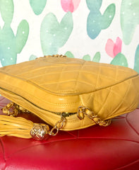 Ves Vintage Chanel yellow lambskin camera bag style chain shoulder bag with fringe and CC stitch mark. Good daily purse. Good fortune color.
