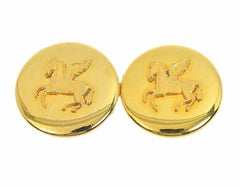 Vintage HERMES gold tone round earrings with Pegasus. Fabulous jewelry piece back in the old era.