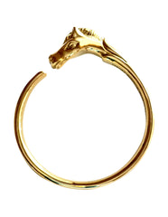 Vintage Hermes golden horse head design bangle, bracelet. Beautiful classic jewelry from Hermes. 0411101