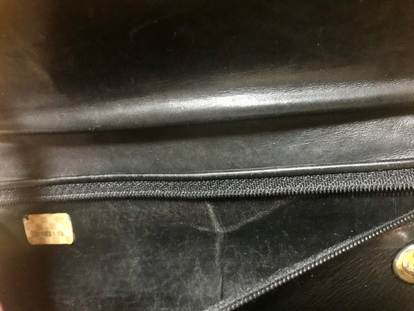 Vintage CHANEL black leather wallet with large CC stitch mark. Rare wallet  from Chanel in 90’s.