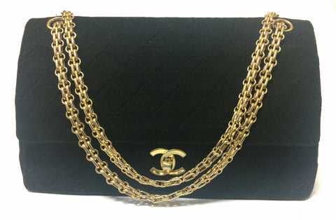 70's vintage Chanel classic black jersey 2.55 bag with double flap and skinny chain straps. One-of-a-kind bag. Ves