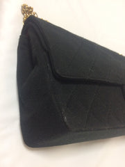 70's vintage Chanel classic black jersey 2.55 bag with double flap and skinny chain straps. One-of-a-kind bag. Ves