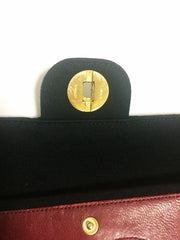 70's vintage Chanel classic black jersey 2.55 bag with double flap and skinny chain straps. One-of-a-kind bag. Ves