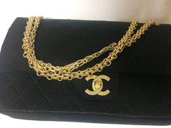 70's vintage Chanel classic black jersey 2.55 bag with double flap and skinny chain straps. One-of-a-kind bag. Ves