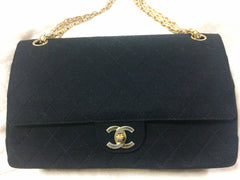 70's vintage Chanel classic black jersey 2.55 bag with double flap and skinny chain straps. One-of-a-kind bag. Ves