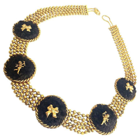 Vintage Karl Lagerfeld golden ball chain belt, necklace with extra large round charms in genuine brown sheep fur, angel, and bow motifs.