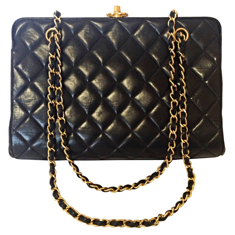 Vintage CHANEL black lambskin golden chain shoulder bag with