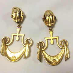 Vintage Karl Lagerfeld golden dangling earrings in drapery window curtain design. Unique and rare jewelry.