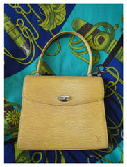 Vintage Louis Vuitton yellow epi Malesherbes handbag. Classic purse for Spring and summer season. Happy color