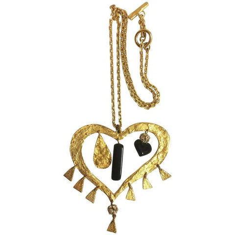 Vintage Christian Lacroix golden outlined large heart pendant top necklace with dangling charms and crystal stones. Perfect gift jewelry.