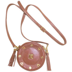 Vintage MCM brown leather round mini Suzy Wong shoulder bag with golden logo motifs. trimmings. Designed by Michael Cromer.