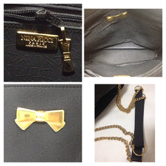 Vintage Nina Ricci black tote bag with golden chain straps with golden logo bow, ribbon shape motif. Perfect daily purse