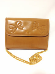 W3. Vintage Nina Ricci tanned brown leather mini clutch shoulder bag with golden chain and ribbon motif stitch marks. 050327re5