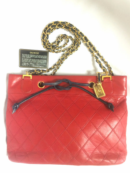 Vintage CHANEL classic tote bag in red leather with gold tone
