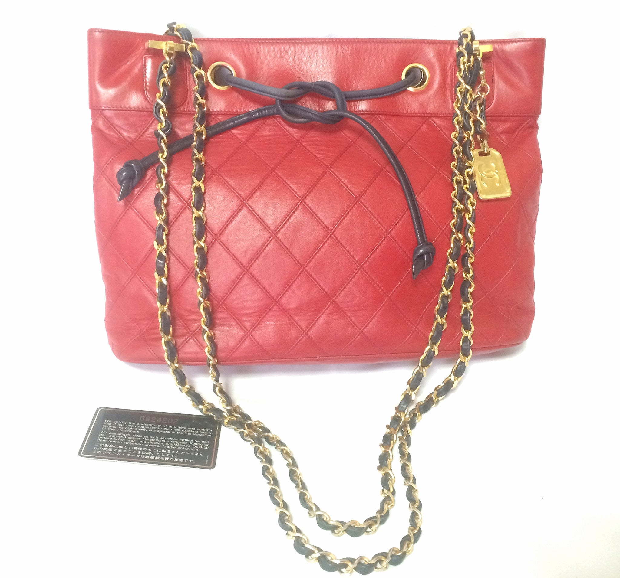 Vintage CHANEL classic tote bag in red leather with gold tone