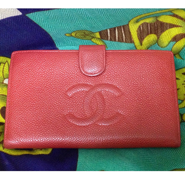 Vintage CHANEL red caviar skin wallet with large CC logo stitch