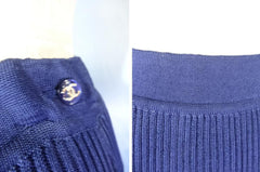 Vintage CHANEL navy knit long skirt with a matching CC button. Sexy and classic long skirt from Chanel. size 40