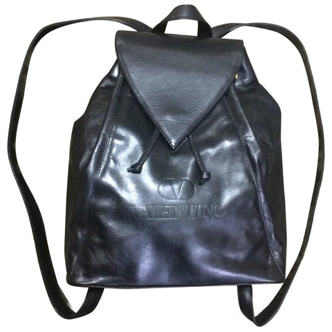 Vintage Valentino black nappa leather backpack with embossed logo. Classic masterpiece.